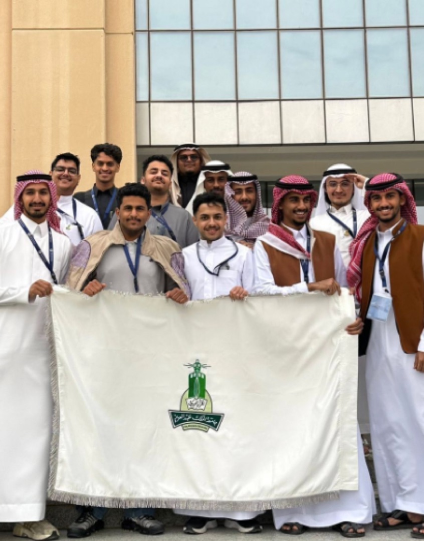 KAU hackathon squad with the university banner